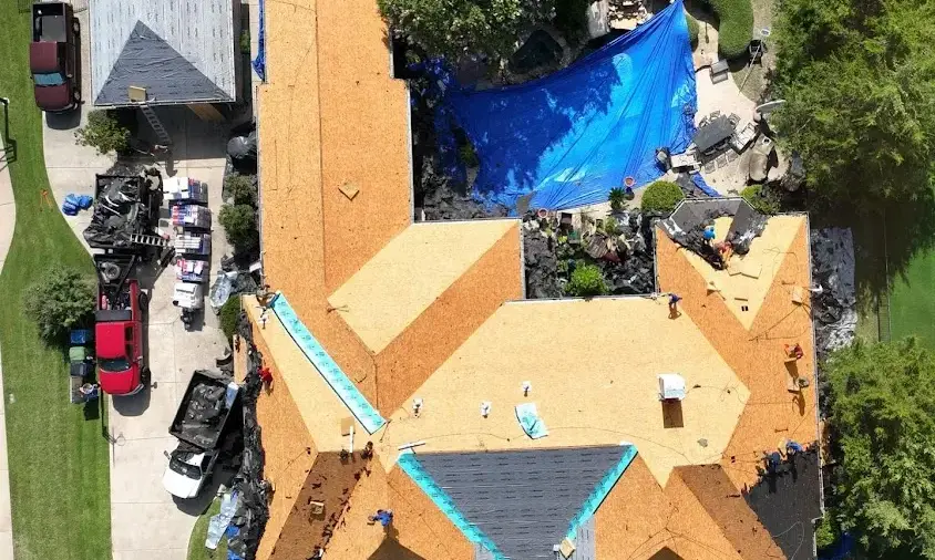 Professional Storm Damage Roof Repair being performed in Laredo
